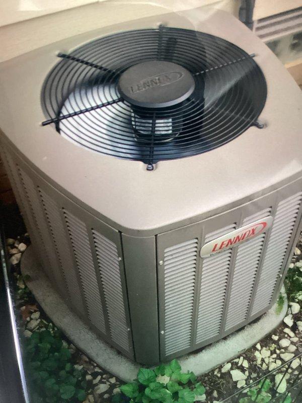 Responded to no cooling complaint following recent tune-up service. Upon arrival, inspected Lennox outdoor condensing unit and performed diagnostic testing. Measured supply air temperature at 50.4°F, confirming adequate cooling performance and proper system operation. Unit found operating within normal parameters with no issues identified.