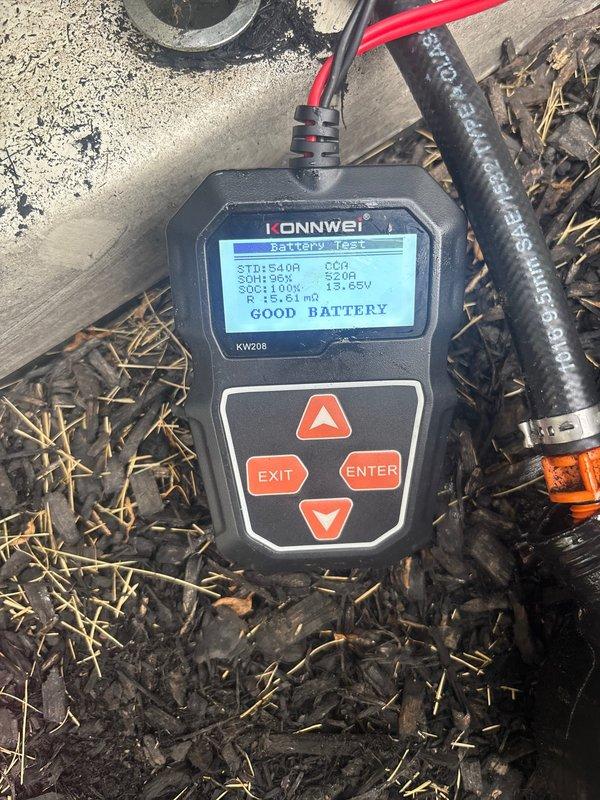 Completed preventive maintenance on 14kW standby generator system. Performed comprehensive battery load test using diagnostic equipment, confirming battery health at 100% state of charge with 13.55V output and acceptable cold cranking amperage within manufacturer specifications. Verified generator status indicator showing proper operational readiness with illuminated run light.