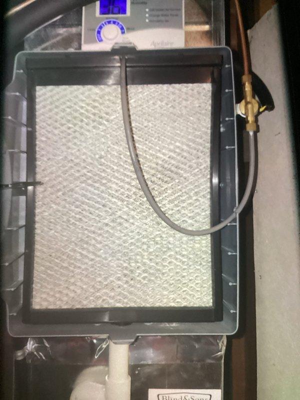 Completed preventive maintenance on 3-year-old residential air conditioning system. Inspected outdoor condensing unit and found heat exchanger coils heavily soiled with dirt, debris, and organic matter accumulation affecting system efficiency. Cleaned condenser coils and removed vegetation growth around unit base. Inspected indoor air handler, verified air filter condition showing clean pleated media with proper airflow. Checked refrigerant lines, electrical connections, and system controls for proper operation. System tested and operating within normal parameters upon completion.
