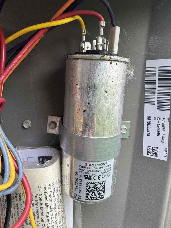 Completed BS-MVP cooling maintenance visit on 7-year-old system. Performed load match verification on both units to confirm refrigerant charge levels. Inspected capacitor which showed significant weathering, discoloration, and surface corrosion with visible rust and grime accumulation. Used TRUE RMS digital multimeter to test electrical components and verify system performance parameters. All readings confirmed proper operation within manufacturer specifications. System operating normally upon completion of maintenance inspection.