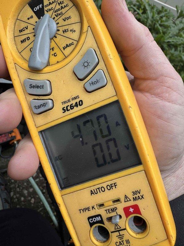 Completed BS-MVP cooling maintenance visit on 7-year-old system. Performed load match verification on both units to confirm refrigerant charge levels. Inspected capacitor which showed significant weathering, discoloration, and surface corrosion with visible rust and grime accumulation. Used TRUE RMS digital multimeter to test electrical components and verify system performance parameters. All readings confirmed proper operation within manufacturer specifications. System operating normally upon completion of maintenance inspection.