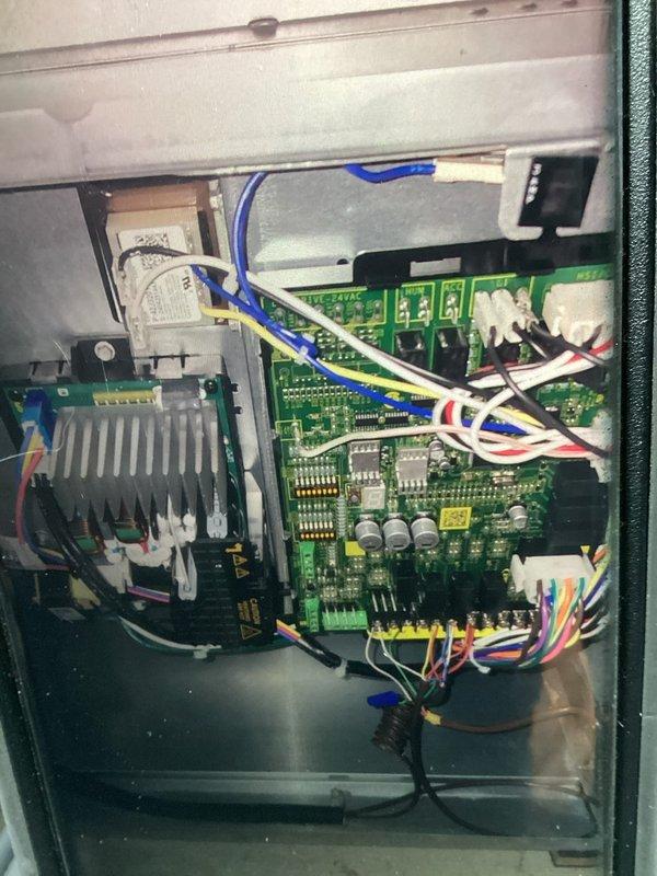 Completed annual cooling maintenance on one-year-old air conditioning system. Inspected electrical components including Edison brand ECNR30 fuses and control boards, verified proper connections and wiring integrity, and documented system condition through photographs. All components operating within normal parameters with no issues identified during this routine preventive maintenance visit.