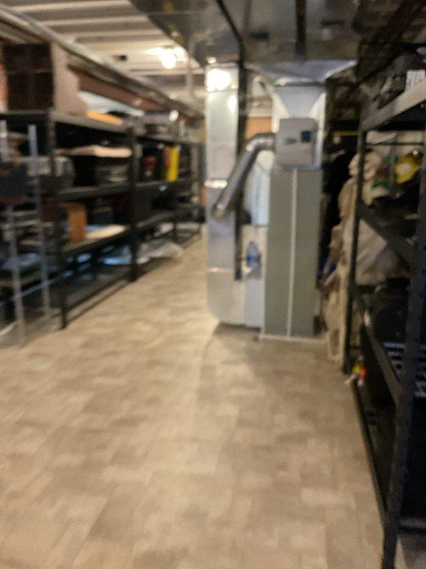 Completed routine air conditioning maintenance on 6-year-old system located in basement utility area. Performed standard tune-up procedures including inspection of HVAC unit, ductwork, and associated components. Evaluated ductwork condition and discussed cleaning recommendations with customer. Customer declined membership program enrollment at this time.