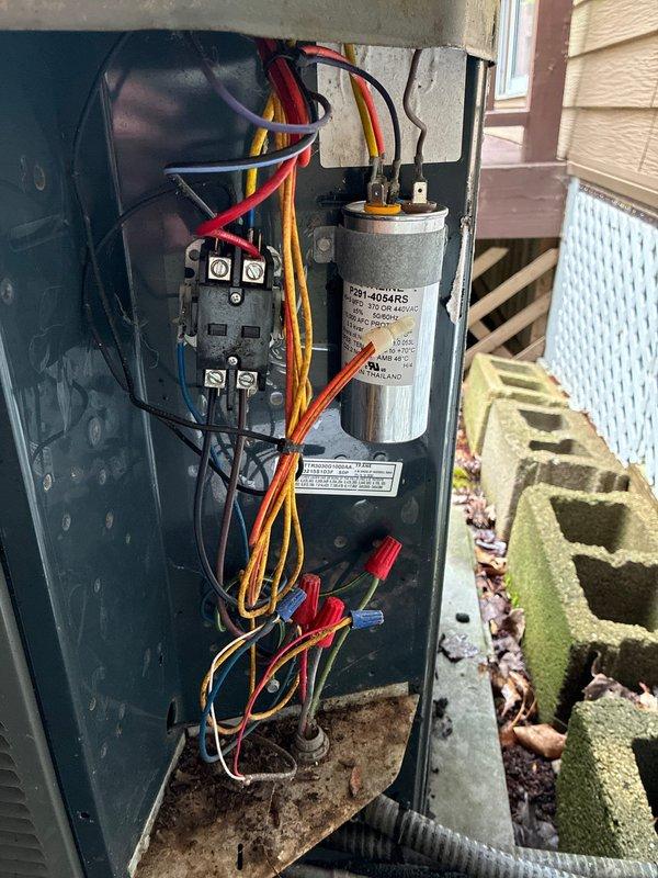Completed BS-MVP cooling maintenance visit on 15-year-old residential air conditioning system. Performed thorough inspection of outdoor condensing unit electrical components, including capacitor (P291-4004RS) and contactor assembly, verifying all wire connections and terminals were secure. Inspected indoor air handler unit and associated ductwork, refrigerant lines, and drainage system to ensure proper operation and identify any potential issues related to system age.