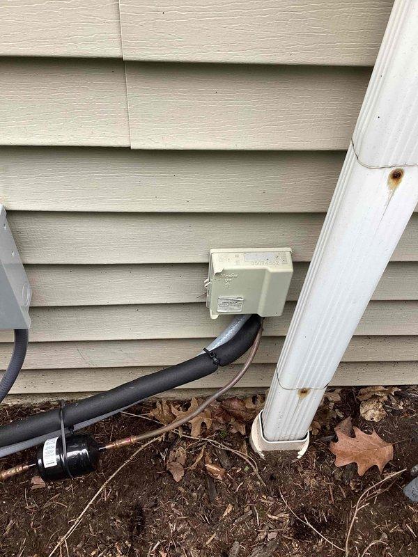 Completed startup and commissioning of newly installed air conditioning system. Verified proper installation of exterior line set connections, diverter box mounting, and electrical conduit routing along building exterior. System tested and confirmed operational, ready for customer use.