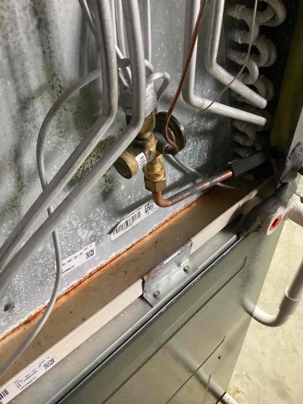 Performed routine maintenance inspection on 2-year-old air conditioning system. Evaluated evaporator coil assembly, refrigerant lines, and condensate drain system for proper operation. Assessed ductwork condition and recommended duct cleaning services to improve system efficiency and indoor air quality.