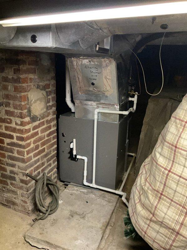Completed routine HVAC maintenance visit for cooling system located in basement utility area. Inspected furnace and air handling unit, documented heavily soiled air filter with significant dust and debris accumulation requiring immediate replacement. Replaced clogged filter to restore proper airflow and system efficiency, noted evaporator coil fins showed dust buildup but remained functional.