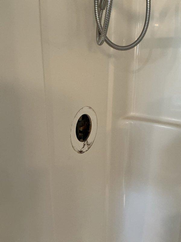 Responded to no-water condition in 30-year-old residence and successfully replaced faulty shower valve. Accessed plumbing through ceiling panel above bathroom fixture, installed new valve assembly with copper connections, and restored full water pressure and functionality to shower system.