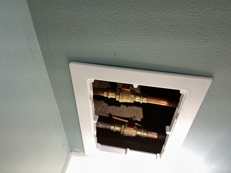 Responded to no-water condition in 30-year-old residence and successfully replaced faulty shower valve. Accessed plumbing through ceiling panel above bathroom fixture, installed new valve assembly with copper connections, and restored full water pressure and functionality to shower system.