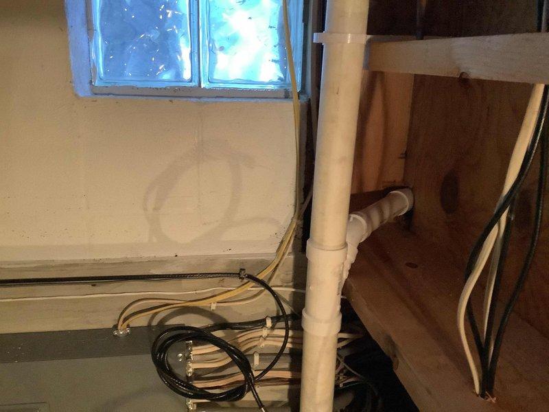 Responded to callback for kitchen sink leak. Upon inspection, accessed plumbing through cabinet and identified leaking drain connections beneath sink. Installed two 2" Fernco caps as planned to repair damaged drain piping. Secured all connections with proper clamps and verified system integrity. Leak successfully resolved and plumbing restored to proper working condition.