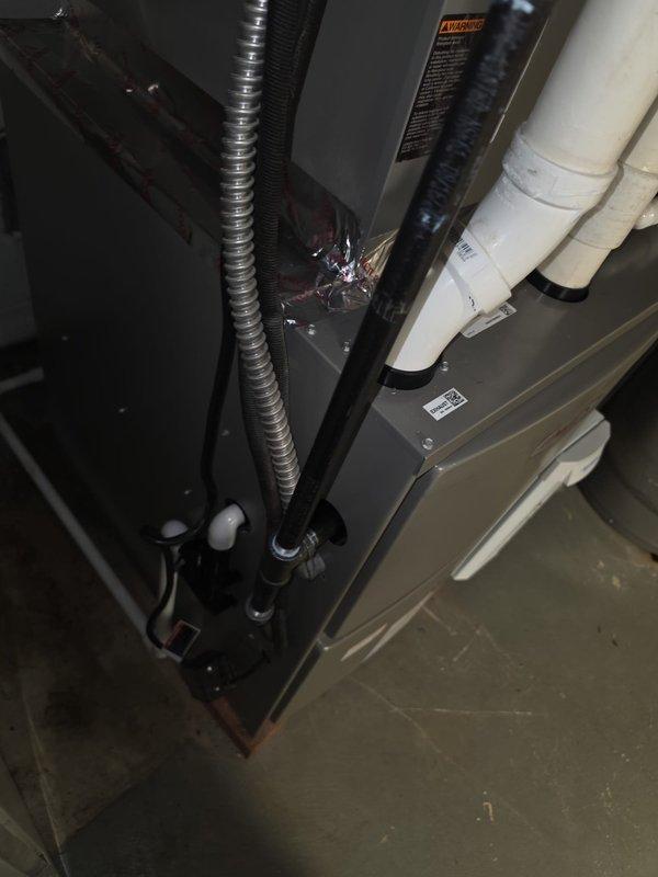 Completed installation of Lennox 90% efficiency furnace as part of secondary installation phase. Unit installed in basement mechanical room with proper electrical connections, flexible conduit routing, PVC venting, and condensate drainage system. All components tested and operational upon completion.