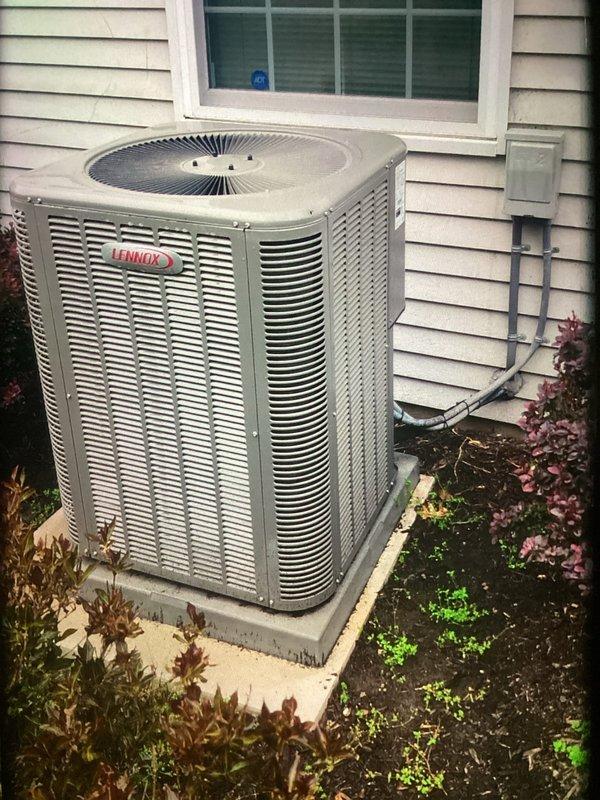 Completed routine AC maintenance on residential Lennox condenser unit. Performed standard inspection of outdoor unit including visual assessment of cabinet condition, clearances, and surrounding area. Inspected electrical components and replaced TR25CR time-delay fuse (250VAC, RK5 rated) in disconnect box. Unit operational with proper clearances maintained from structure and adequate airflow around condenser. All electrical connections secure and system functioning within normal parameters.