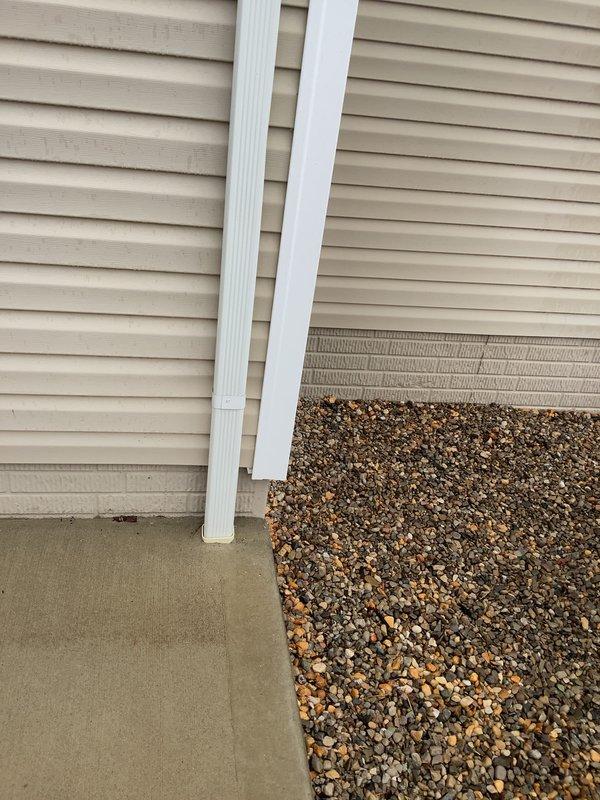 Conducted site evaluation for residential air conditioning system replacement and relocation. Assessed existing 10-year-old outdoor condenser unit currently positioned on concrete pad adjacent to structure with vinyl siding, documented electrical disconnect configuration and refrigerant line routing. Provided comprehensive estimate for system relocation options and equipment upgrade to higher-capacity unit to meet enhanced cooling requirements.