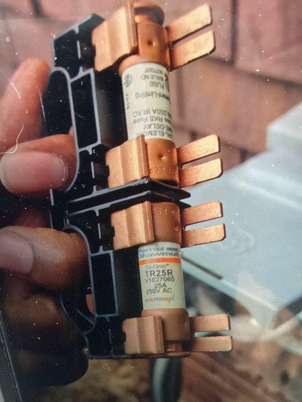 Completed yearly maintenance on 3-year-old Lennox AC system. Performed comprehensive tune-up including inspection of furnace unit, verification of electrical components including 25A 250V AC time-delay fuses (TR25R), checked refrigerant lines and copper piping connections, inspected PVC condensate drainage system, examined air filter condition, and verified all mechanical and electrical connections throughout the system. All components found operating within normal parameters with no immediate service needs identified.