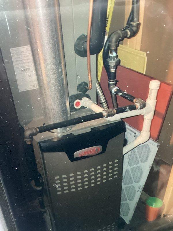 Completed yearly maintenance on 3-year-old Lennox AC system. Performed comprehensive tune-up including inspection of furnace unit, verification of electrical components including 25A 250V AC time-delay fuses (TR25R), checked refrigerant lines and copper piping connections, inspected PVC condensate drainage system, examined air filter condition, and verified all mechanical and electrical connections throughout the system. All components found operating within normal parameters with no immediate service needs identified.