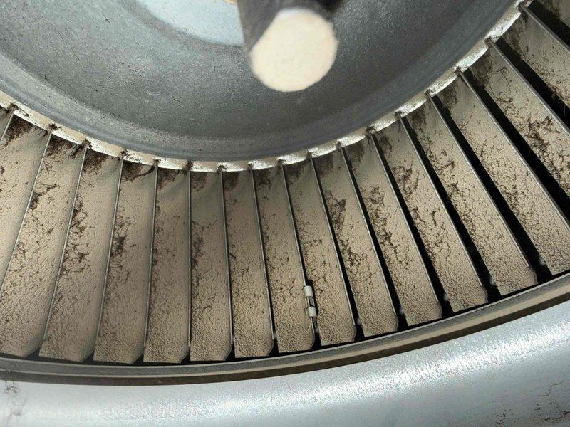 # HVAC Maintenance - Cooling Service Completed

Performed comprehensive MVP cooling maintenance visit on residential HVAC system. Conducted thorough inspection of furnace unit and air handling components, including examination of ductwork connections, refrigerant lines, and blower assembly. Visual inspection revealed significant dust and debris accumulation on blower wheel blades, which was documented through photographic evidence. Verified proper operation of all cooling system components and confirmed system functionality. All maintenance tasks completed successfully per MVP recurring service protocol.