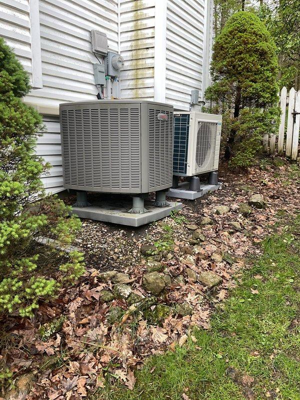 Returned to property to level outdoor air conditioning unit that had settled unevenly on its concrete pad. Applied gravel base material from warehouse inventory beneath and around the equipment pad to ensure proper drainage and stability. Work was performed during appropriate weather conditions with temperatures consistently at or above 65 degrees as required for safe installation. Completed exterior work without requiring interior access to the residence. Both HVAC units now sit level on stabilized concrete pads with adequate gravel bedding for long-term support and water management.