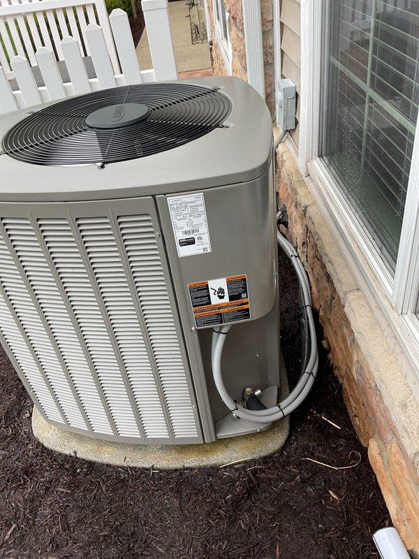 Performed comprehensive AC tune-up on residential outdoor condensing unit approximately 3-4 years old. Conducted full system inspection including electrical connections, refrigerant lines, condenser coil cleaning, and fan operation verification. Unit found in good working condition with proper clearances maintained; all components operating within normal parameters and system ready for cooling season.