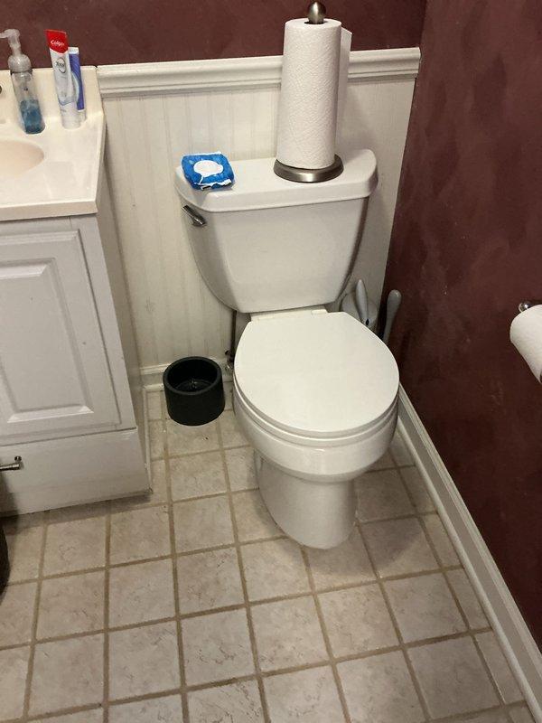 Responded to service call for inoperative hot water heater in 50-year-old residence. Upon arrival, inspected AO Smith 100-gallon tanked water heater located in basement utility area. Unit was not producing hot water as reported. Conducted diagnostic assessment of water heater system, including examination of heating elements, thermostat functionality, gas supply connections, and associated plumbing infrastructure. Evaluated copper and steel piping network, shut-off valves, and pressure relief valve for proper operation. Documented existing installation configuration with exposed brick and concrete block walls in unfinished basement setting. Assessed overall condition of unit and surrounding plumbing connections. Provided technical findings and recommendations to homeowner regarding repair or replacement options based on age and condition of existing equipment.