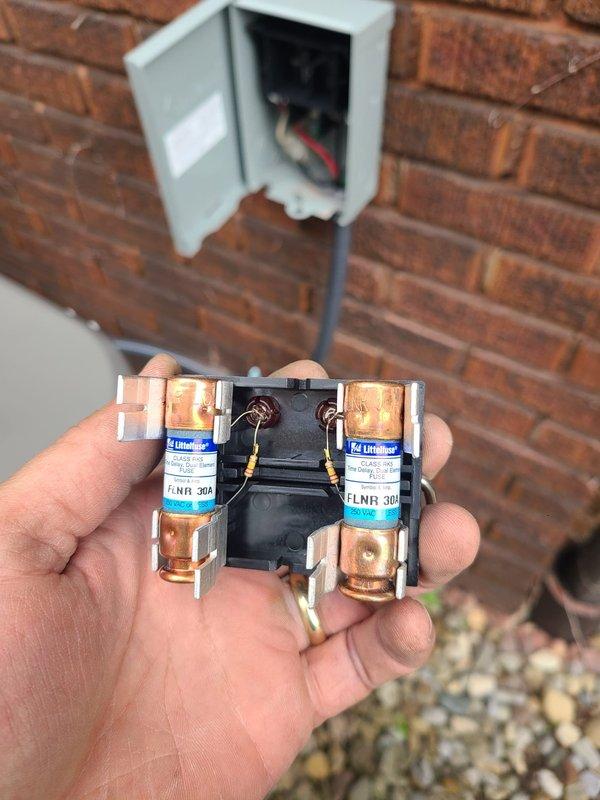 Completed installation of a 90% efficiency Lennox furnace and air conditioning system. Installed new furnace unit with proper PVC venting configuration, mounted 30-amp Littelfuse FLNR fuses in exterior disconnect, and established all necessary electrical connections with appropriate conduit routing to exterior junction box. All equipment tested and operational upon completion.