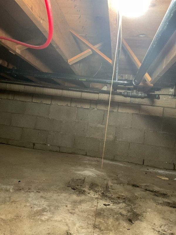 Replaced defective kitchen drain line in crawlspace by removing existing piping from the drop beneath the kitchen sink back to the eye fittings. Installed new drain line with long sweep 90-degree fitting to improve drainage flow and prevent future clogs. Added cleanout access point for maintenance purposes. All work completed in crawlspace area with proper fitting connections to ensure code compliance and optimal drain performance.