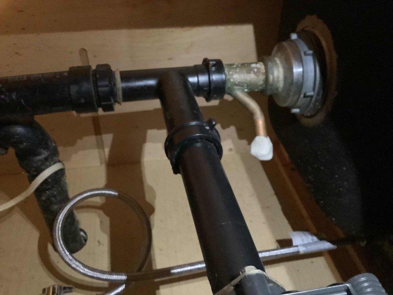 Conducted a comprehensive plumbing estimate for replacing deteriorated copper supply piping located beneath the kitchen sink and assessing requirements for new dishwasher installation. Evaluated existing under-sink plumbing configuration, including aged copper water lines showing signs of tarnish and wear, and documented current cabinet conditions with photographic evidence for accurate material and labor calculations. Prepared detailed scope of work covering removal of existing copper piping, installation of new supply lines with appropriate fittings and shutoff valves, and integration of dishwasher supply and drain connections to meet code requirements.