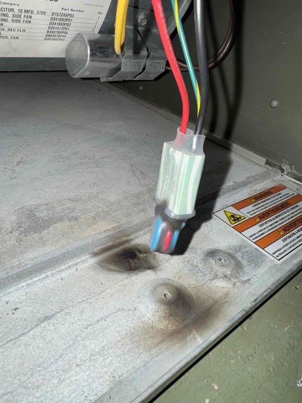Completed MVP AC maintenance on office cooling system. Replaced failed dual run capacitor (30 MFD, 370V) which showed visible heat damage and charring. Verified all electrical connections, tested system operation, and confirmed unit returned to normal cooling function.