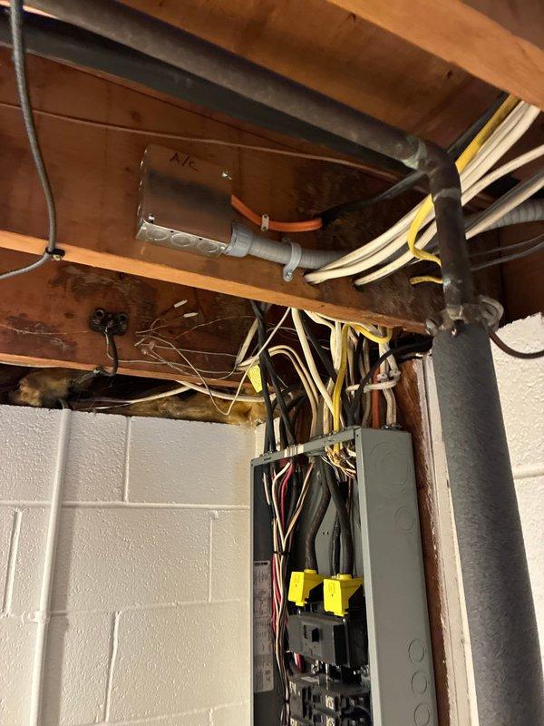 Completed service call back to upgrade electrical wiring to AC unit following new furnace installation. Replaced undersized conductors with properly rated wire per manufacturer specifications and code requirements, ensuring adequate ampacity for the HVAC system. Verified all connections at main panel and equipment disconnect, confirmed proper wire routing through ceiling joists, and tested system operation upon completion.