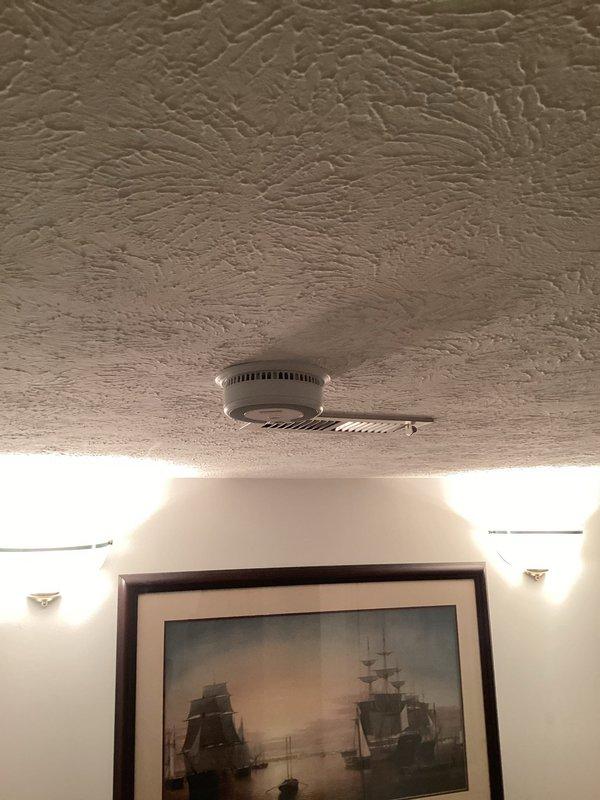 Replaced six smoke detectors throughout the residence, including installation of new units in two bedrooms that previously lacked proper smoke detection coverage. All detectors were mounted to code specifications on ceilings with proper clearances from walls and corners. Verified power connections and tested all units for proper functionality upon completion.