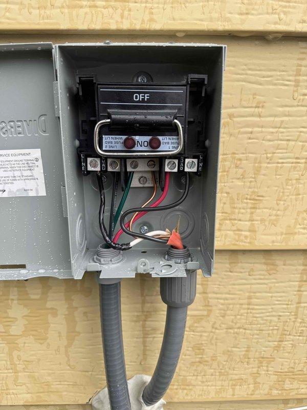 Completed electrical circuit mapping and labeling for residential service panel, documenting all breaker assignments for outlets, lighting fixtures, and HVAC equipment throughout the property. Updated circuit directory with detailed room-by-room breakdowns including main bathroom outlets, basement Keller outlets, utility and hallway lighting, bathroom ventilation fan, and living room area circuits. Serviced exterior AC disconnect switch, verifying proper wire terminations at terminal block and confirming all connections secure with appropriate wire nuts installed.