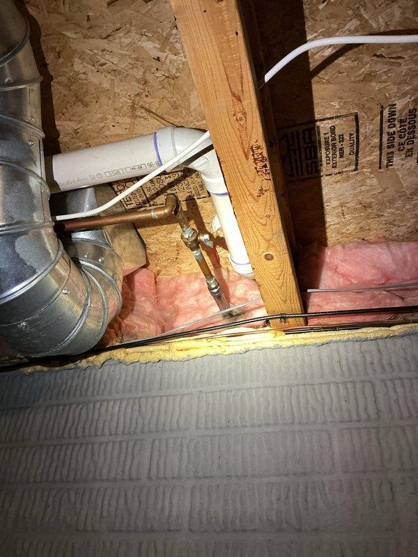 Responded to service call for leaking frost-free spigot that failed to shut off water flow completely. Inspected exterior hose bib mounted on vinyl siding and traced supply line to shutoff valve in attic crawl space. Replaced faulty frost-free sillcock assembly and verified proper operation of shutoff mechanism. Tested unit for complete water shutoff and confirmed no leakage at exterior spout or interior connection points.