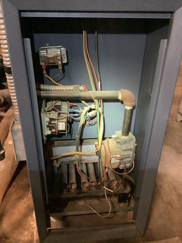 Responded to service call for pilot light failure on 20-year-old residential boiler system. Upon arrival, performed visual inspection of boiler cabinet and internal components. Diagnosed faulty thermocouple as root cause preventing pilot flame from remaining lit. Replaced defective thermocouple with new unit and tested pilot assembly for proper flame retention. Verified gas supply pressure, cleaned pilot orifice, and inspected burner assembly for proper operation. Cycled system multiple times to confirm reliable ignition and flame sensing. Unit now operating within normal parameters with pilot remaining lit consistently.