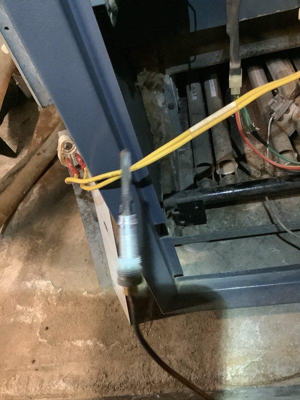 Responded to service call for pilot light failure on 20-year-old residential boiler system. Upon arrival, performed visual inspection of boiler cabinet and internal components. Diagnosed faulty thermocouple as root cause preventing pilot flame from remaining lit. Replaced defective thermocouple with new unit and tested pilot assembly for proper flame retention. Verified gas supply pressure, cleaned pilot orifice, and inspected burner assembly for proper operation. Cycled system multiple times to confirm reliable ignition and flame sensing. Unit now operating within normal parameters with pilot remaining lit consistently.