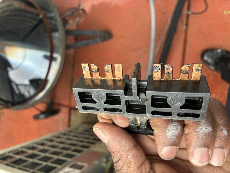 Performed comprehensive tune-up on 25-year-old air conditioning system. Inspected and tested electrical components including terminal block, which showed signs of oxidation on copper terminals. Conducted electrical diagnostics using clamp meter to verify proper amperage draw and system performance, ensuring unit operates within manufacturer specifications despite age of equipment.