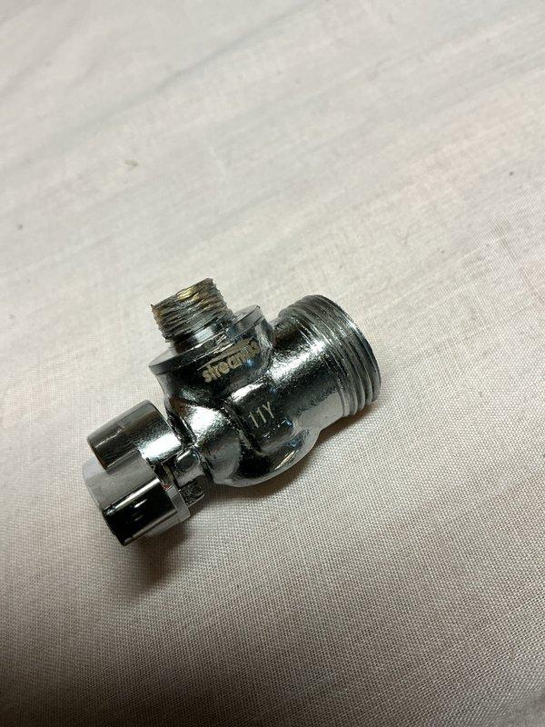 Responded to callback for water leak at humidifier valve following recent hot water tank installation. Upon inspection, identified active leak at humidifier saddle valve connection point on copper water line. Removed defective saddle valve fitting and replaced with new valve assembly. Tested all connections for proper seal and verified no further leakage present. System restored to full operation.