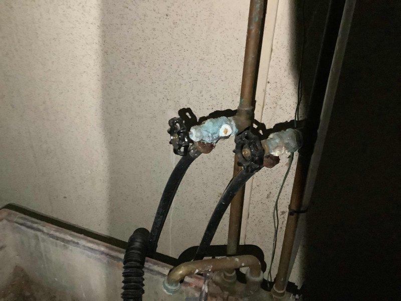 Responded to slow-draining vanity sink in bathroom of 50-year-old home. Upon inspection, accessed plumbing system through crawl space and identified drainage issue related to aged piping infrastructure. Examined supply line connections, shut-off valves, and drain assembly showing mineral buildup and corrosion consistent with original plumbing installation. Cleared obstruction from drain line, verified proper water flow, and tested system to ensure complete drainage restoration. All fixtures returned to normal operation.
