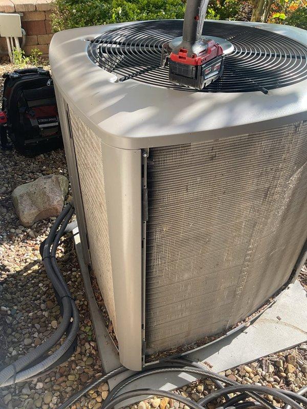 Responded to no cooling call and performed diagnostic evaluation of outdoor condensing unit. Upon inspection, discovered failed fuses in disconnect box preventing power to compressor and condenser fan motor. Removed and replaced dual Ferraz Shawmut TR40R 600V AC time-delay fuses, restored power to unit, and verified proper system operation with all components running within normal parameters.