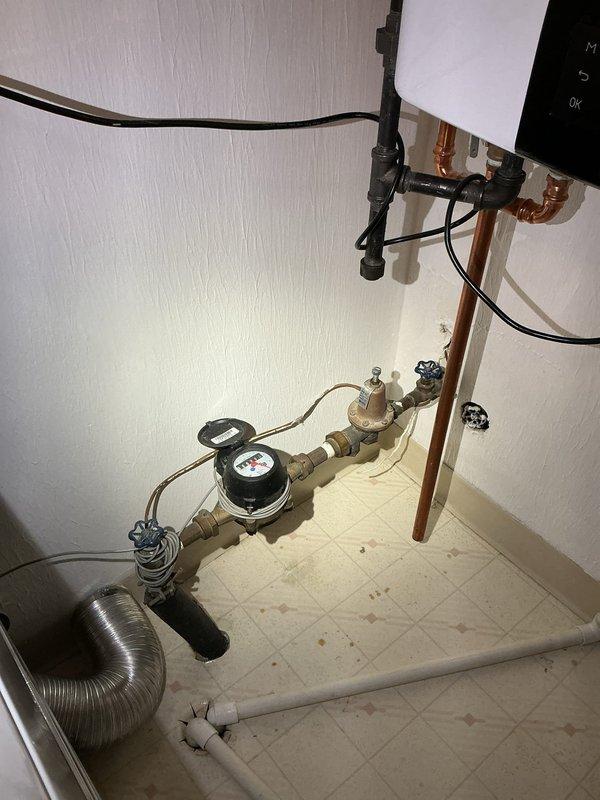 Conducted on-site evaluation for exterior hose bib replacement on residential property. Inspected existing outdoor spigot mounted on vinyl siding, noting current fixture condition and connection points. Assessed interior plumbing infrastructure including water supply lines, shut-off valves, and water meter assembly to determine optimal replacement approach and verify compatibility with existing copper piping system. Performed complimentary water quality testing as requested to evaluate overall system performance and identify any potential concerns with water supply.