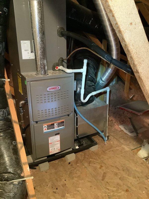 Completed comprehensive AC tune-up on a five-year-old Lennox system with attic-mounted air handler and outdoor condensing unit. Performed full system inspection including electrical connections, capacitor testing, refrigerant pressures, condensate drain verification, and airflow assessment. All components operating within manufacturer specifications; system cleaned, tested, and left in proper working condition.