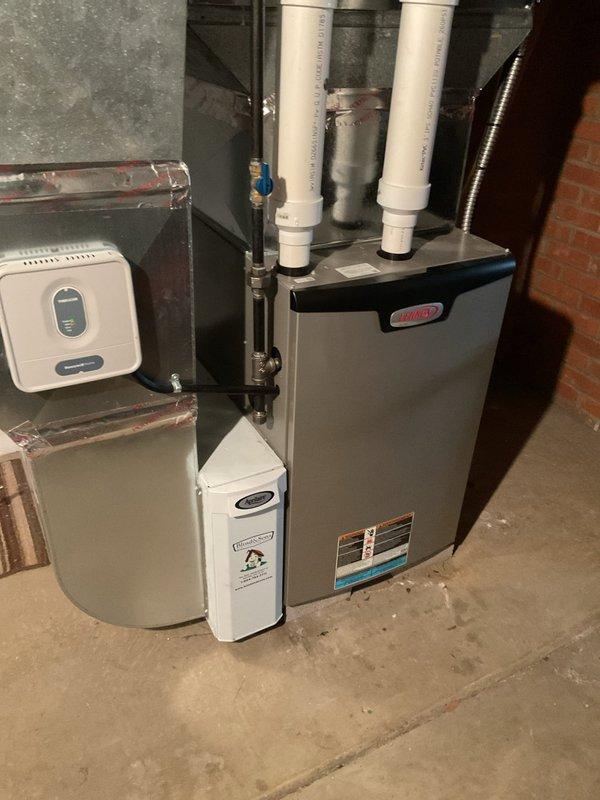 Responded to no-heat call on 2-year-old Lennox furnace. Upon arrival, conducted systematic diagnostic of unit that would not initiate heating cycle. Performed visual inspection of all accessible components including heat exchanger, gas valve assembly, ignition system, and electrical connections. Verified proper gas supply and pressure to unit. Tested thermostat operation and confirmed call for heat signal reaching furnace control board. Inspected flame sensor for contamination buildup, which was found to be preventing proper flame recognition. Cleaned flame sensor using appropriate abrasive pad to remove oxidation and carbon deposits. Verified all wire connections were secure and properly seated. Tested furnace through multiple heating cycles to confirm proper ignition sequence, flame establishment, and consistent operation. Unit cycled normally with no error codes displayed. System returned to full operational status with proper heat output confirmed at supply registers.