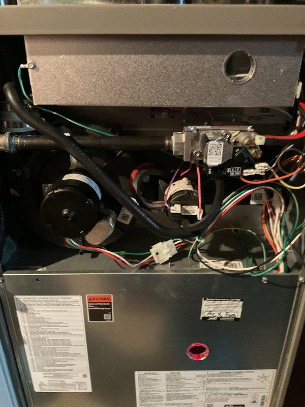 Responded to no-heat call on 2-year-old Lennox furnace. Upon arrival, conducted systematic diagnostic of unit that would not initiate heating cycle. Performed visual inspection of all accessible components including heat exchanger, gas valve assembly, ignition system, and electrical connections. Verified proper gas supply and pressure to unit. Tested thermostat operation and confirmed call for heat signal reaching furnace control board. Inspected flame sensor for contamination buildup, which was found to be preventing proper flame recognition. Cleaned flame sensor using appropriate abrasive pad to remove oxidation and carbon deposits. Verified all wire connections were secure and properly seated. Tested furnace through multiple heating cycles to confirm proper ignition sequence, flame establishment, and consistent operation. Unit cycled normally with no error codes displayed. System returned to full operational status with proper heat output confirmed at supply registers.