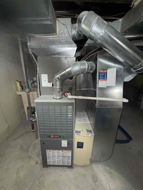 Completed preventive maintenance cooling visit on 4-year-old residential air conditioning system with Trane furnace and outdoor condenser unit. Performed comprehensive inspection of indoor and outdoor components, verified proper operation of condenser unit with functional fan assembly, checked refrigerant lines and electrical connections, and confirmed system is operating within normal parameters. All equipment found in good working condition with no immediate service needs identified.