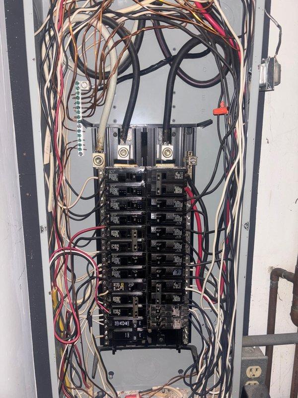 Responded to failed electrical inspection to address multiple code violations. Repaired service disconnect guard that had become detached and installed duct seal at service cable entry point per NEC 225.27. Corrected improper bonding configuration at interior subpanel by relocating grounding electrode conductor to the main service disconnect, as subpanel bonding violates NEC 250.24. Inspected and verified water line bonding system for compliance with 2023 NEC requirements. All corrections completed to bring installation into code compliance for re-inspection.