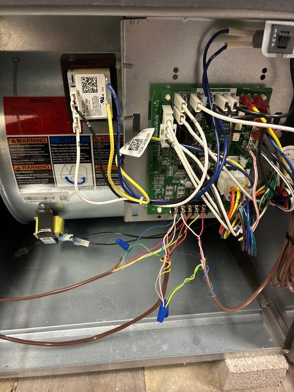 Completed comprehensive MVP tune-up service on cooling system, including full inspection of HVAC unit interior components, refrigerant lines, and electrical control systems. Verified proper operation of control board connections, inspected all wire harnesses and electrical components within the enclosure, and documented equipment condition with detailed photography including QR-tagged identification labels for service tracking purposes.