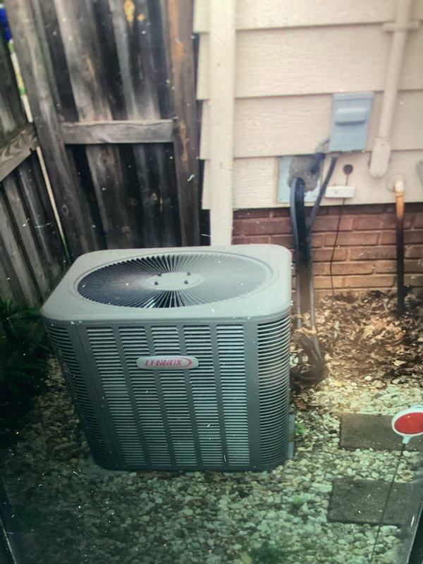Completed routine air conditioning maintenance on residential Lennox condensing unit. Performed standard system inspection, verified operational status of all components, and confirmed proper airflow through coils and fan assembly. Customer provided replacement filter for system.