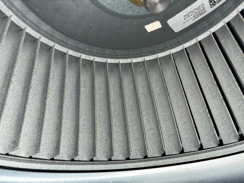 Completed routine preventive maintenance on 6-year-old Lennox cooling system. Inspected blower wheel assembly and confirmed proper blade condition and cleanliness, verified outdoor condensing unit operation with no obstructions to airflow, and documented system components including fan motor and electrical connections. Minor algae growth noted on exterior unit casing but does not affect system performance.