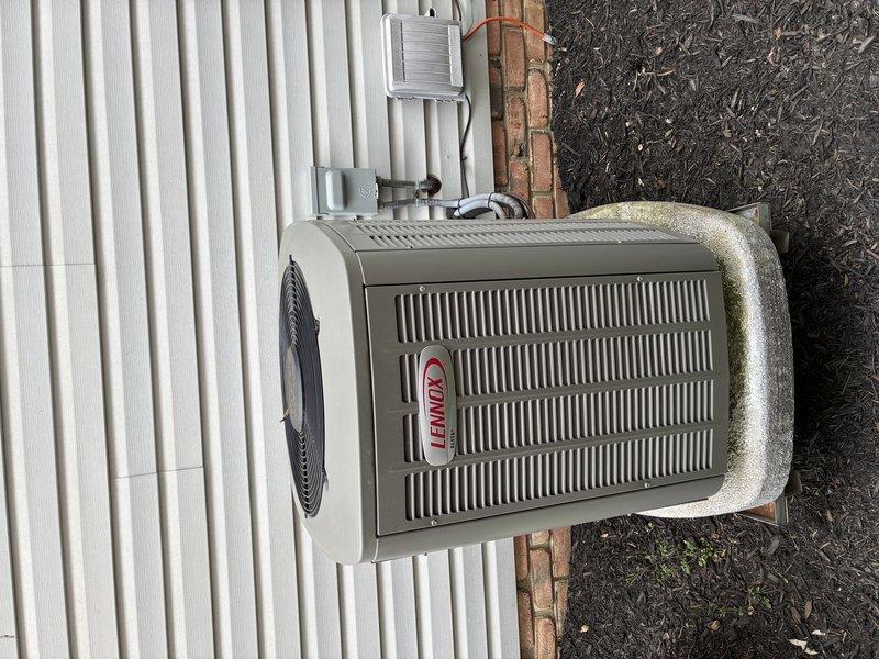 Completed routine preventive maintenance on 6-year-old Lennox cooling system. Inspected blower wheel assembly and confirmed proper blade condition and cleanliness, verified outdoor condensing unit operation with no obstructions to airflow, and documented system components including fan motor and electrical connections. Minor algae growth noted on exterior unit casing but does not affect system performance.
