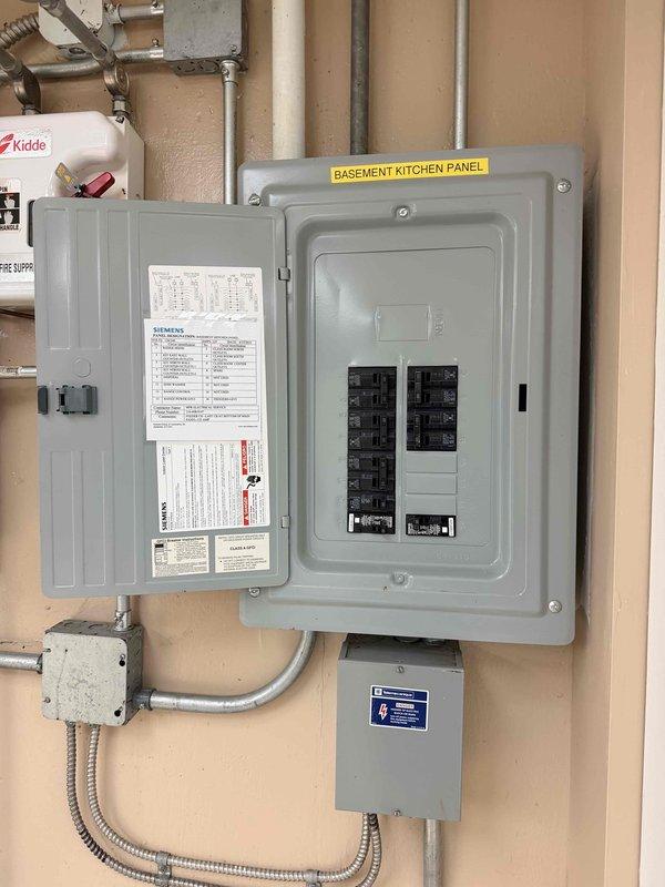 Conducted comprehensive commercial boiler system estimate at church property. Assessed existing electrical infrastructure including basement kitchen panel with Siemens components and associated safety equipment. Evaluated HVAC distribution system and measured floor register dimensions to determine compatibility requirements for proposed boiler installation and heating system modifications.