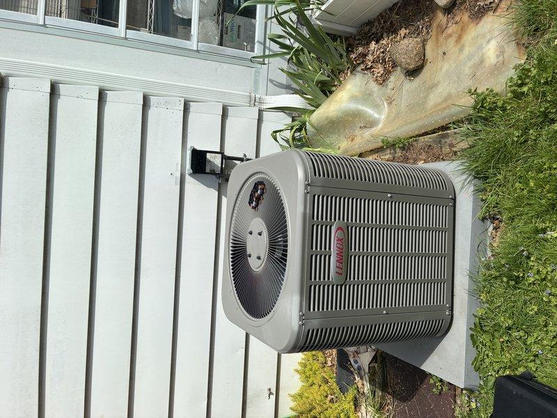 Completed preventive maintenance inspection on 9-year-old Lennox air conditioning system. Performed electrical diagnostics using clamp meter to verify proper amperage draw and system operation. Inspected outdoor condenser unit, confirmed adequate airflow through coil fins, and verified unit is operating within manufacturer specifications.