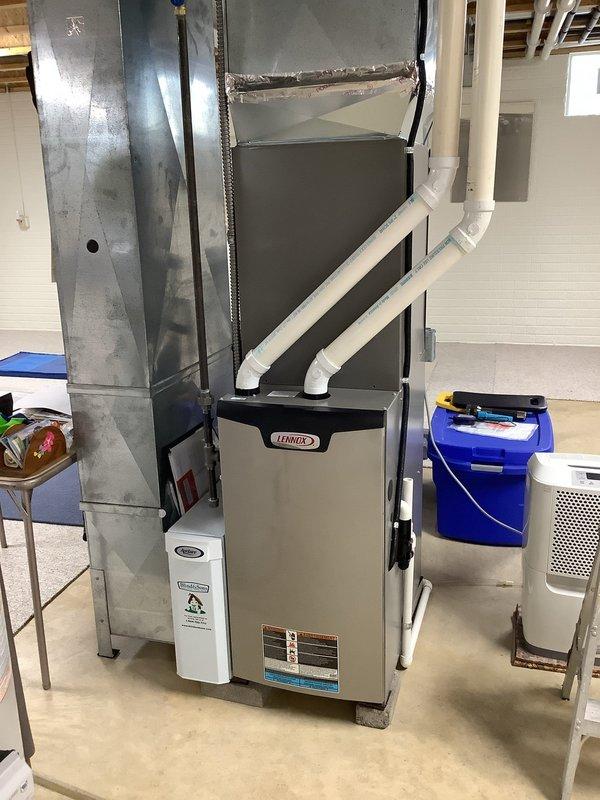 Completed scheduled preventive maintenance on residential split-system air conditioning unit. Performed comprehensive inspection of outdoor condensing unit and indoor Lennox furnace with evaporator coil, verified proper refrigerant levels, checked electrical connections at disconnect box, and confirmed system operation. All components found in good working condition with no deficiencies noted.